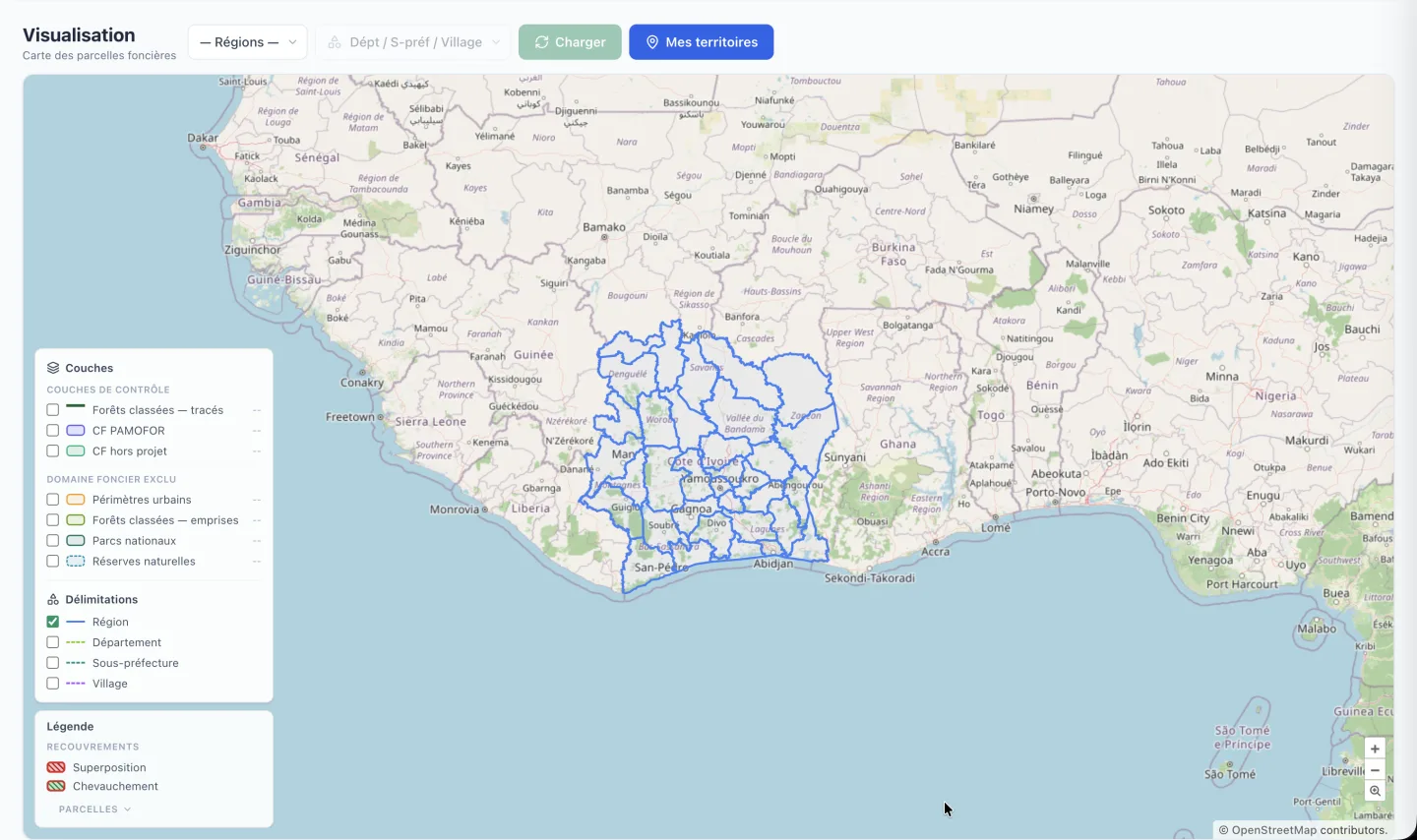 Vue « Visualisation » de SCCARTO : limites des régions de Côte d’Ivoire sur fond OpenStreetMap, panneau des couches de contrôle, du domaine foncier exclu et des délimitations administratives.