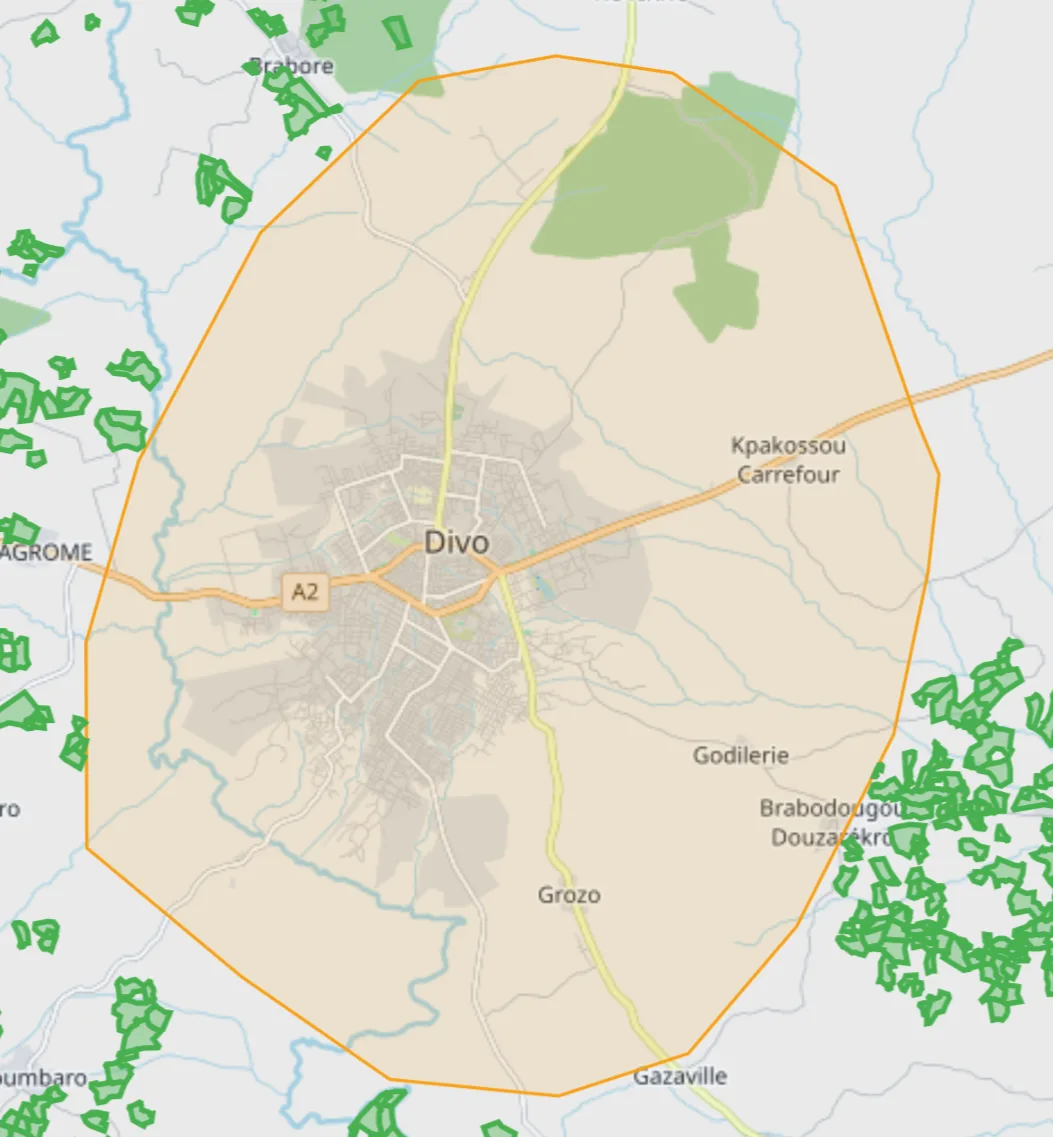 Carte d’une ville : un périmètre orange entoure la ville ; des parcelles vertes se trouvent autour du périmètre.